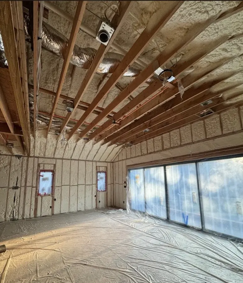 Interior walls and ceiling insulated with spray foam during new construction in Arvada
